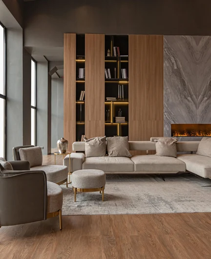 7d1a9675-abce-482b-b054-72d7f7661b09-living-room-marble-wall-fireplace-stylish-bookcase-chic-expensive-interior-luxury-country-house-with-modern-design-with-wood-led-light-gray-furniture-with-gold-elements.jpg